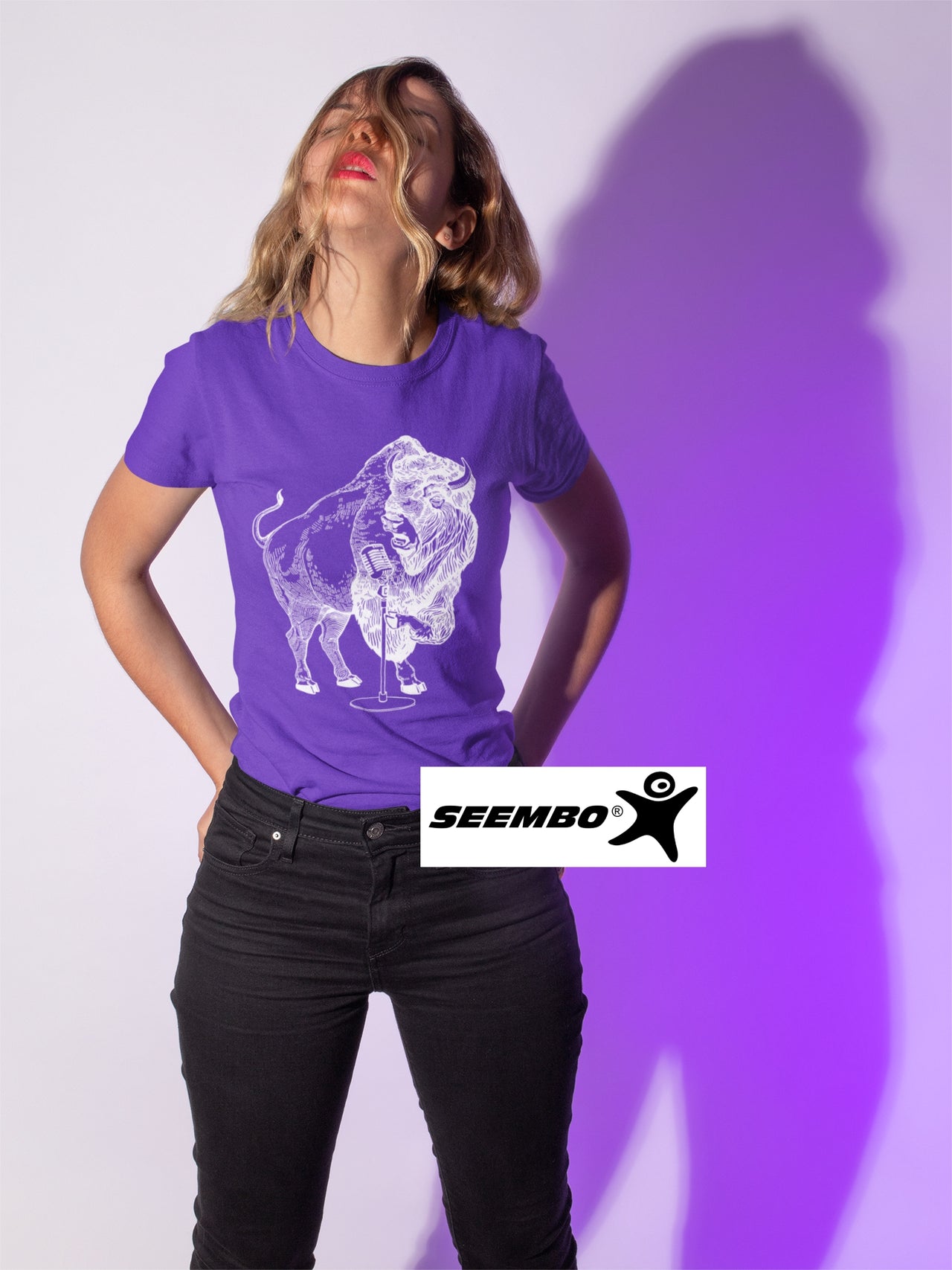 seembo-bison-trying-to-sing-of-a-woman-wearing-a-purple-t-shirt-and-puckering-her-lips