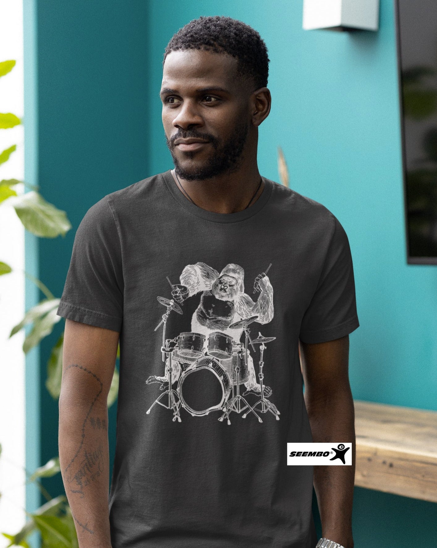 seembo-gorilla-playing-drums-drummer-a-man-with-asphalt-t-shirt